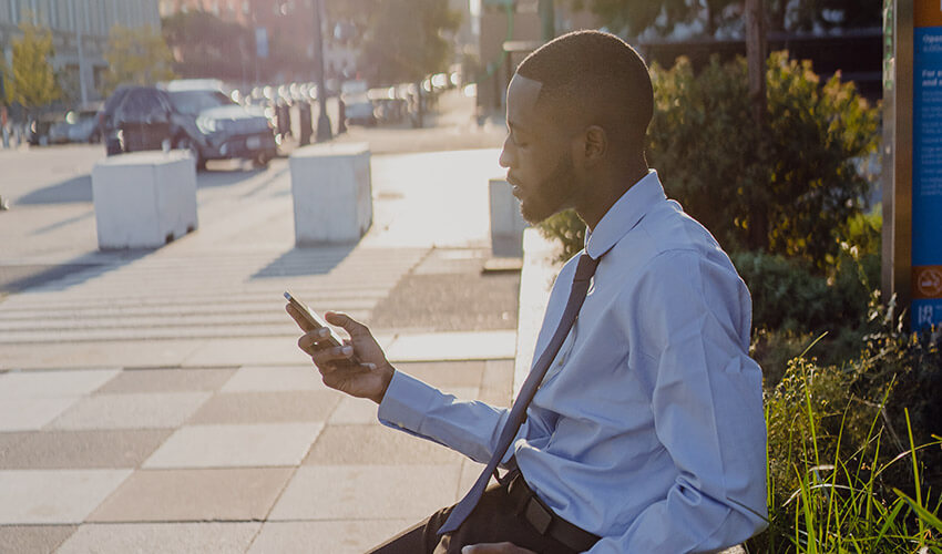 A man looking at his mobile phone