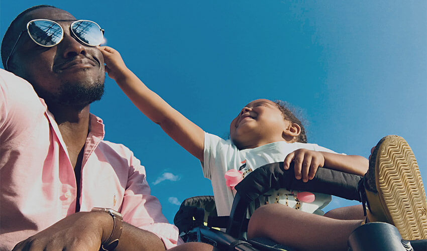 A man and his daghter playing